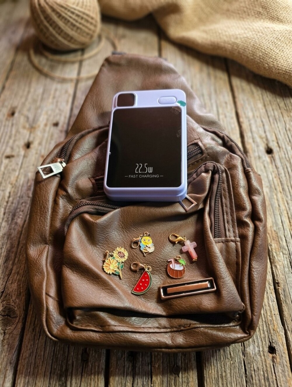 Brown Leather Mini Backpack with Decorative Charms And Magnetic Powerbank